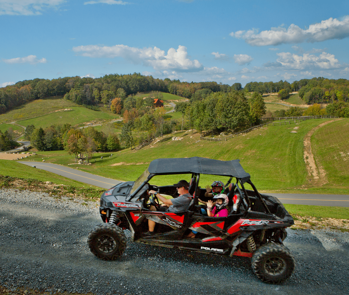Off-road vehicle on scenic hillside